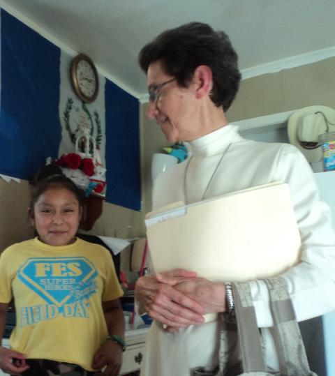 Sr. Marta Lucía Tobón of the Guadalupan Missionaries of the Holy Spirit talks with Magdalena and her family after the raid in 2019. (Sr. María Elena Méndez)